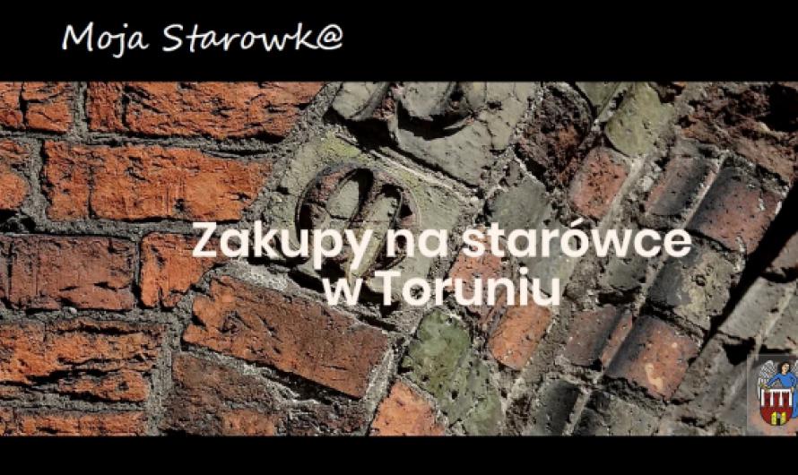 Grafika z tekstem:  Zakupy na starówce w Toruniu  